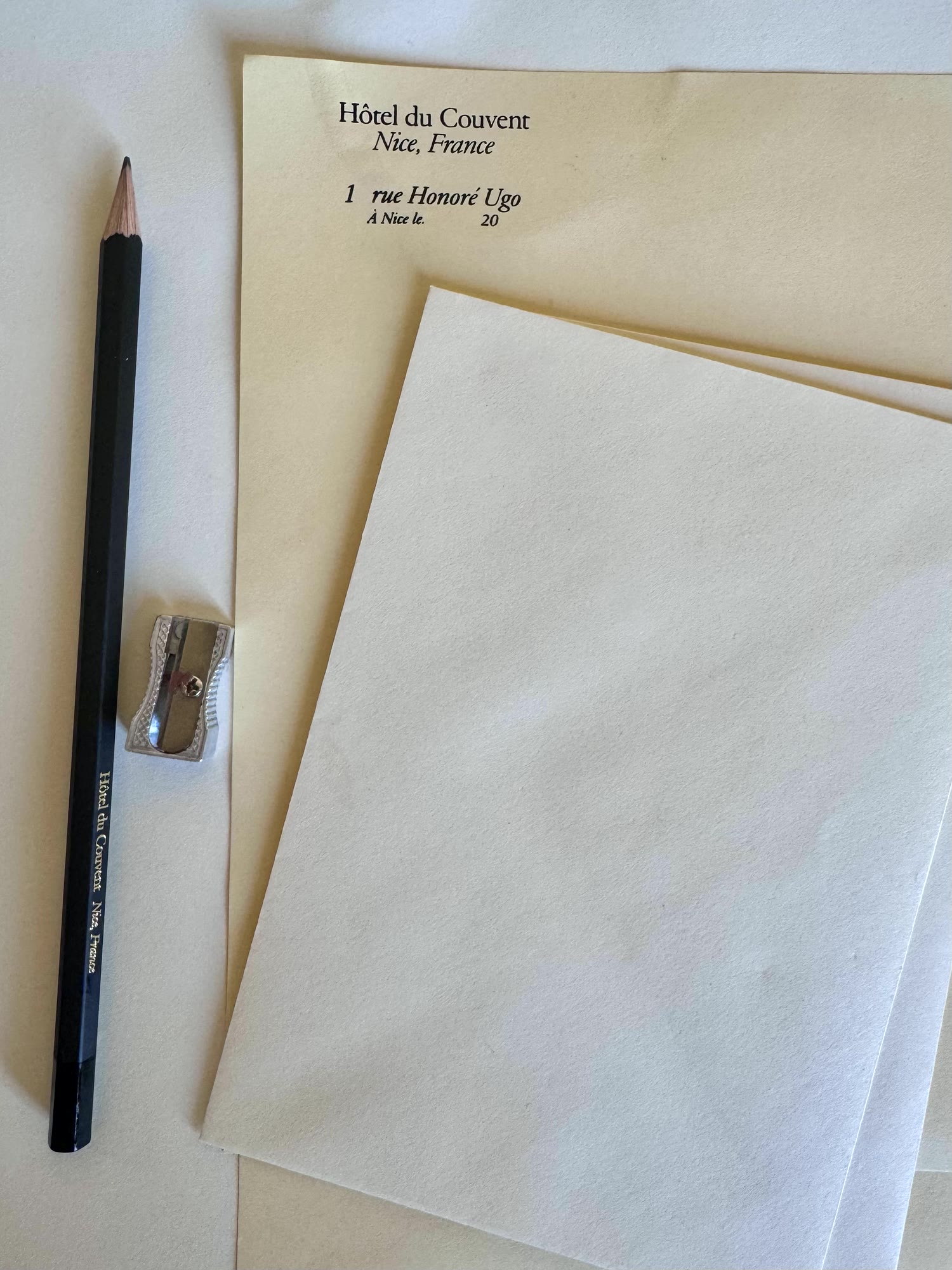 Hôtel du Couvent letterhead, a pencil and a sharpener
