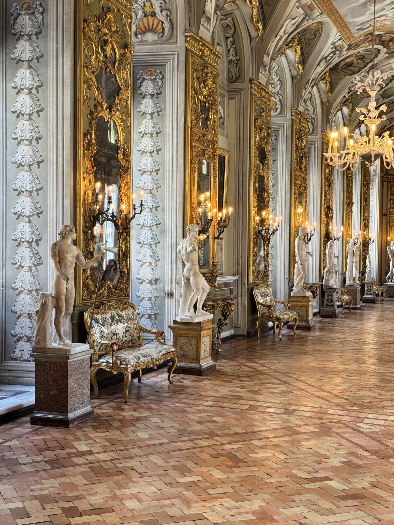 The gilded Gallery of Mirrors at the Galleria Doria Pamphilj, Rome