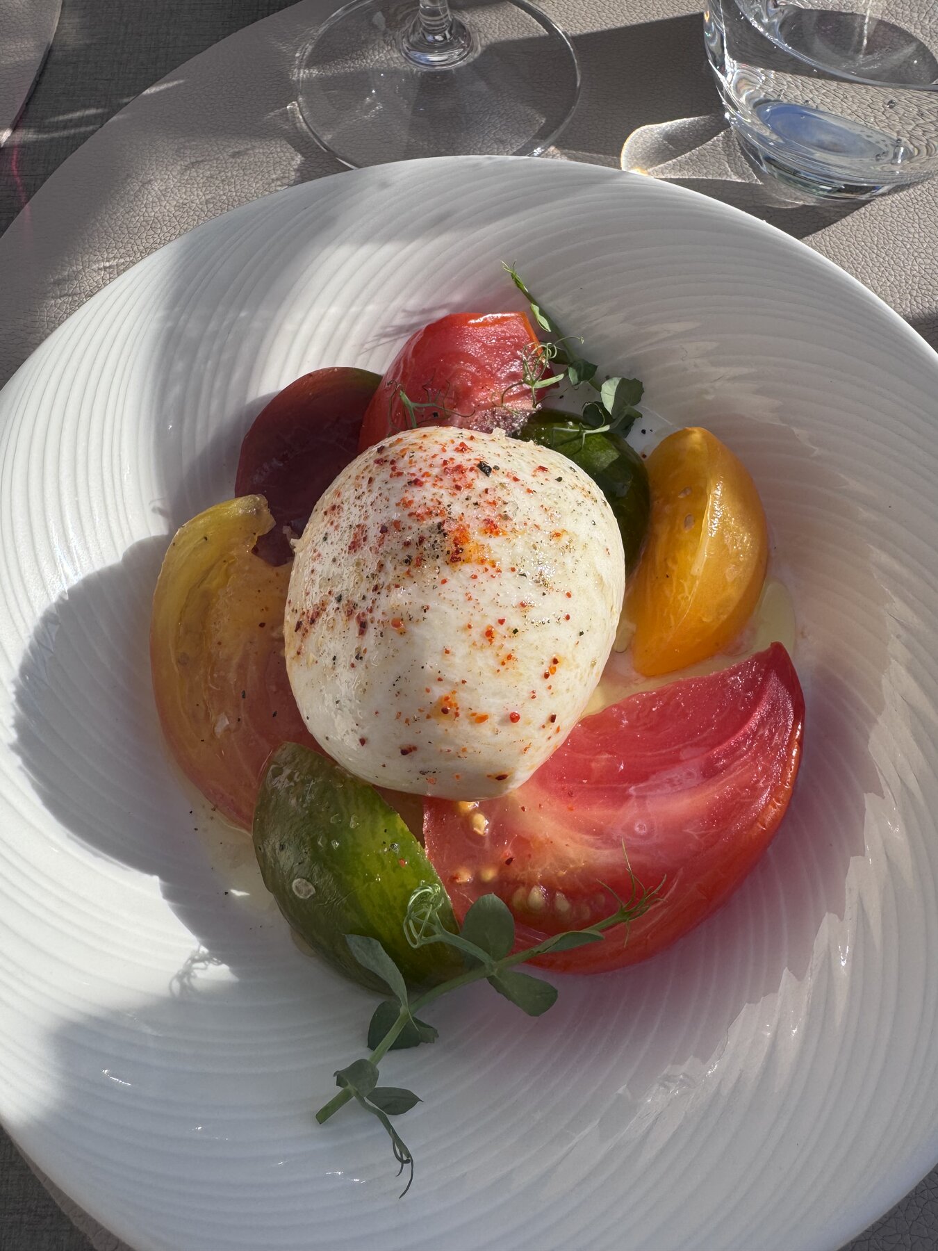 Tomatoes and burrata in the sun, Trianon Palace