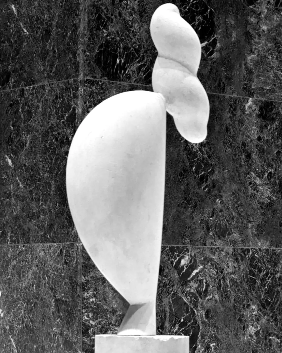 A Brancusi marble form against a marble wall, Neue Nationalgalerie