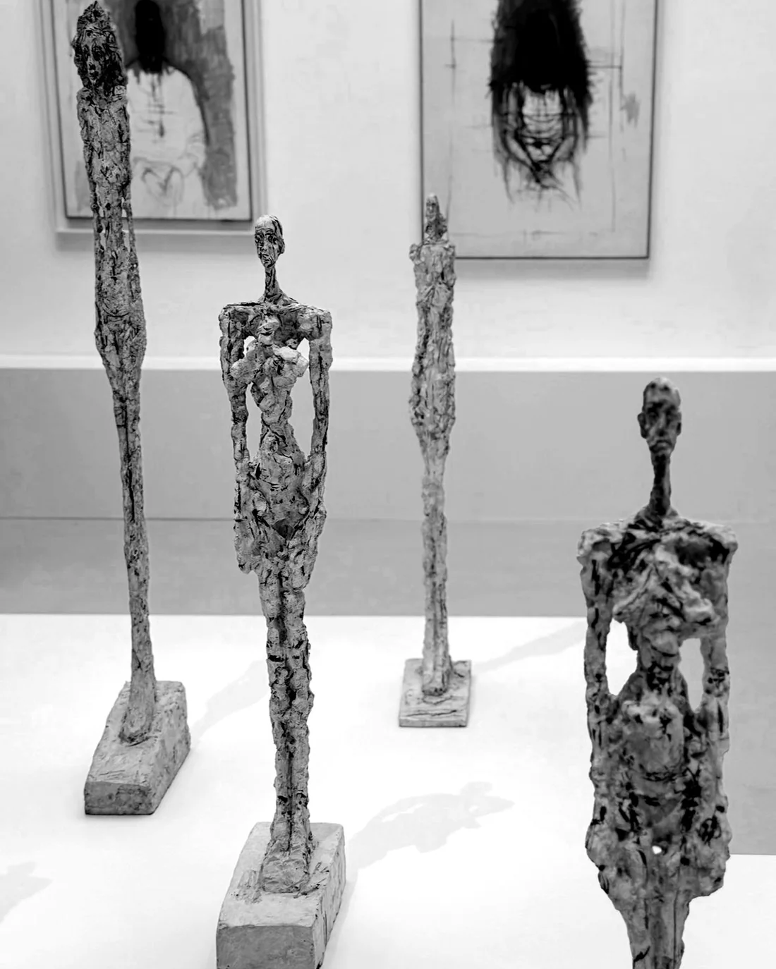 Giacometti figures in a gallery